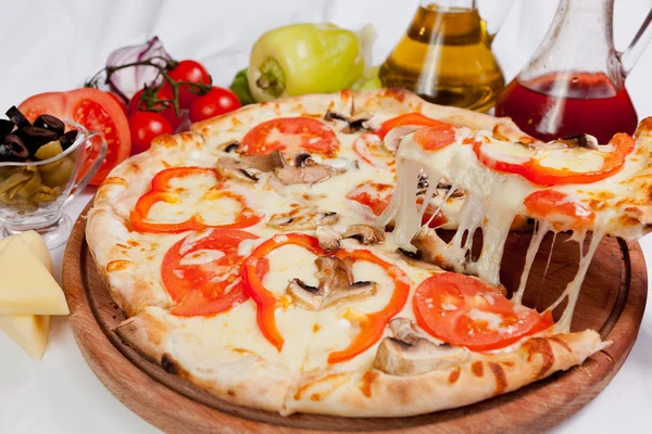 Pizza lifted slice — Stock Photo, Image
