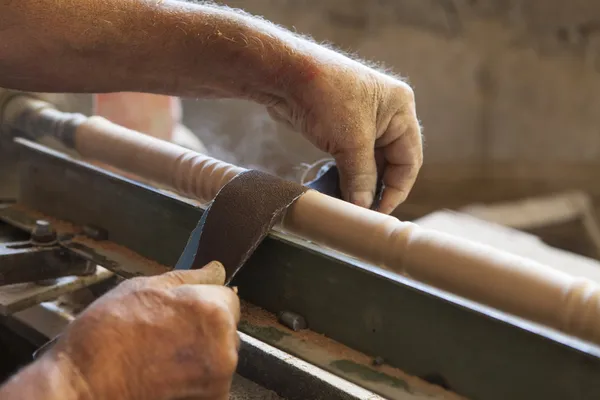 Worker grinding with no safety equipment — Stock Photo, Image