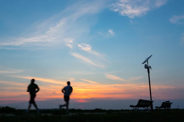 Corredores ao pôr-do-sol — Fotografia de Stock