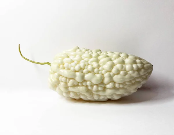 white jade balsam pear is laying on whithe background