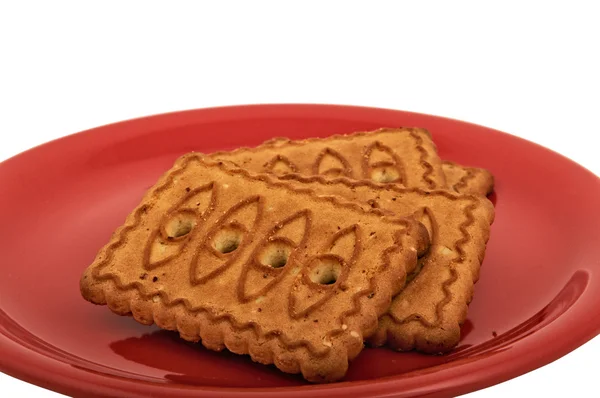 Biscuits au beurre dans une assiette rouge — Photo