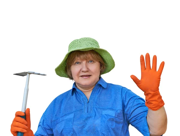 Ανώτερος γυναίκα στα γάντια με εργαλεία κήπου — Φωτογραφία Αρχείου