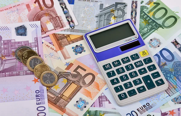 Euro Notes, Coins and Calculator Stock Photo