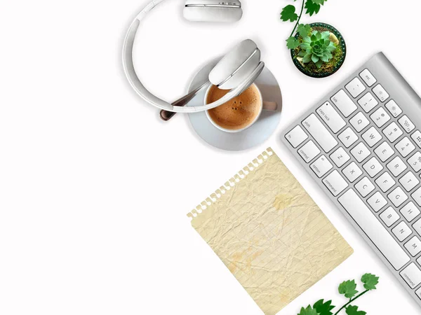 Creative Flat lay of Desktop, Stationery, Keyboard, Headphones and Lifestyle Items on White Background with Copy Space