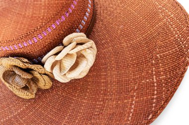 Close up of authentic handmade straw Panama Hat or sombrero at the traditional outdoor market in Cuenca, Ecuador. Popular souvenir from South America and Ecuador. 