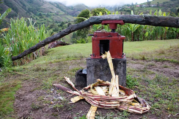 Simple sugar cane press machine  to queezes juice used at small rural settlemen in ecuadorian Andes