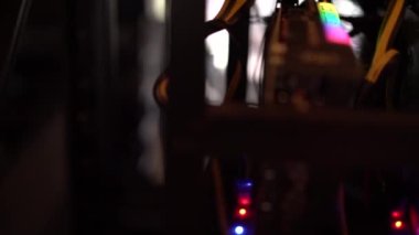 Blurred Bitcoin mining farm.  GPU for cryptocurrency miner.  4k resolution footage concept