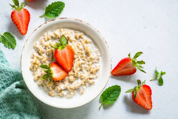 Oatmeal Porridge Strawberry White Background Healthy Breakfast Top View — стоковое фото