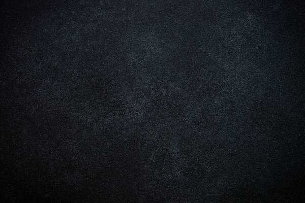 Чёрный фон. Текстура черного камня, свободное пространство для дизайна.