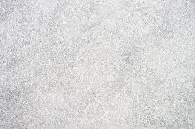 Beyaz arka plan, açık gri taş yüzey. Tasarım için yaratıcı alan.