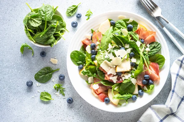 Salad Jamon Green Leaves Pear Blueberry Top View White Background — Fotografia de Stock