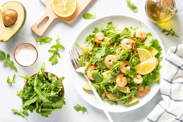 Green Shrimp Salad Arugula Avocado White Table Top View Image — Stockfoto