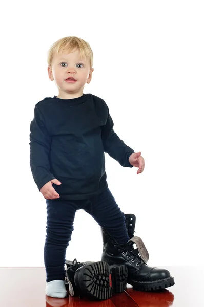 Little boy and big shoes — Zdjęcie stockowe