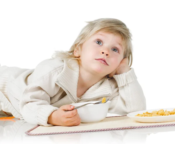 Boy and cereals — Stock Photo, Image