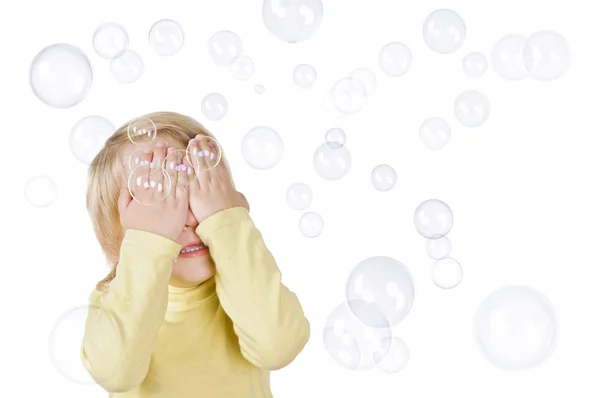 Petit garçon et bulles de savon — Photo