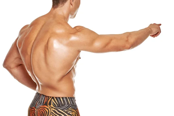 Back View Strong Muscular Bodybuilder Pointing White Background — 图库照片