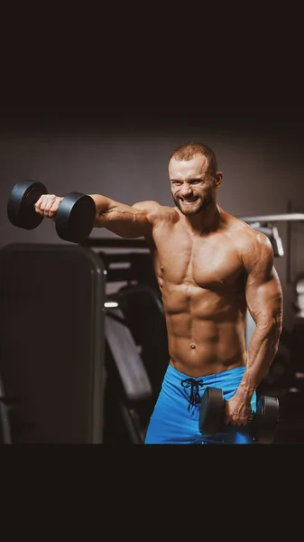 Handsome Bodybuilders Grimace Effort Posing Dumbbells Modern Gym Image Smartphone — Stock Photo, Image