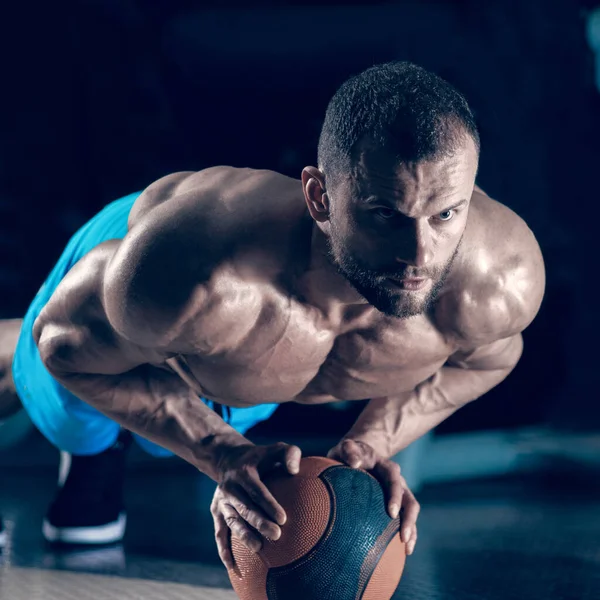 Muscular Athletic Man Doing Push Cross Fit Ball Image Cold — Stok fotoğraf