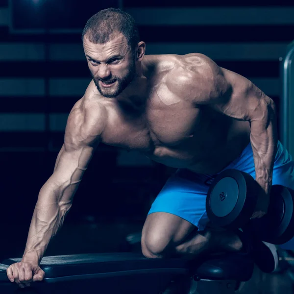 Powerful Young Bodybuilder Exercising Modern Gym Dumbbells Image Cold Vintage — Stock Photo, Image