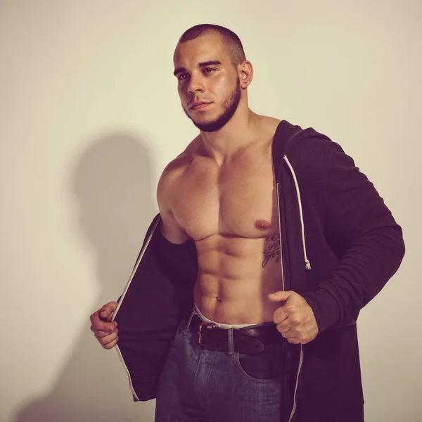 Male Fitness Model Showing Strong Muscular Body Light Gray Background — Stockfoto