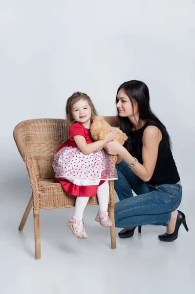 Beautiful little girl with mother — Stock Photo, Image