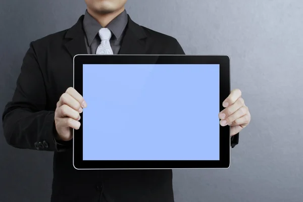 Holding a tablet pc — Stock fotografie