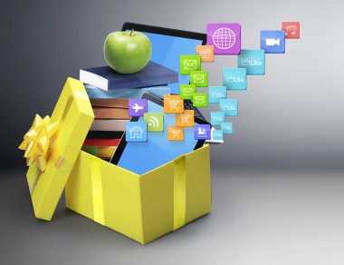 Mobil tablet cihazlar ve açık hediye kutusu