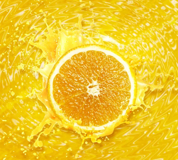 Orange juice splashing — Stock Photo, Image