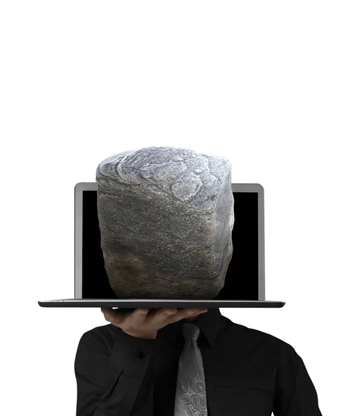 Holding a laptop and Stone — Stock Photo, Image