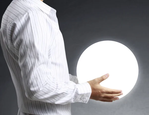 Holding globe in his hands — Stock Photo, Image