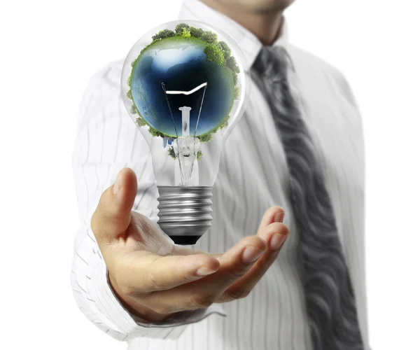 Light bulb, in hand — Stock Photo, Image