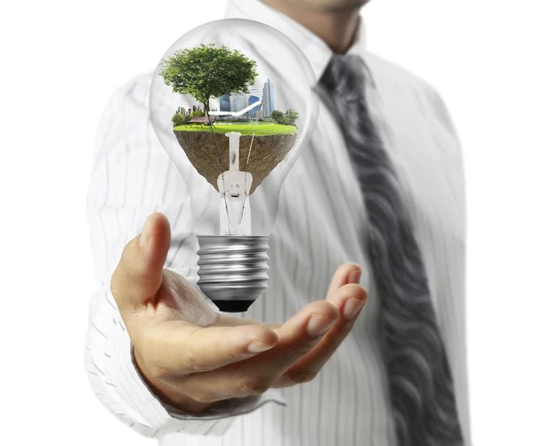 Light bulb, in hand — Stock Photo, Image