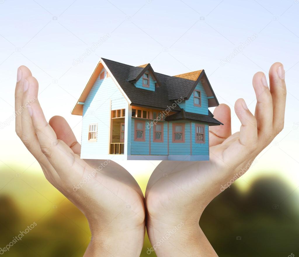 Hand holding house Stock Photo by ©violetkaipa 32040747