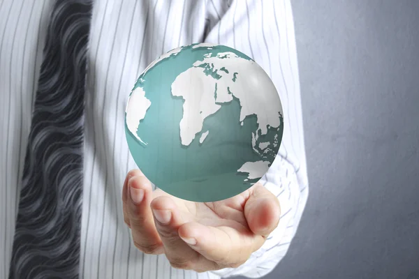 Glowing earth globe in his hands — Stock Photo, Image