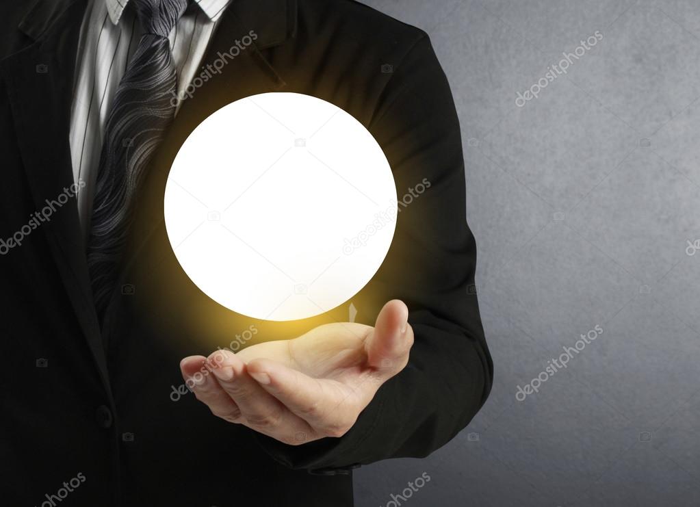 hand holding Crystal Ball