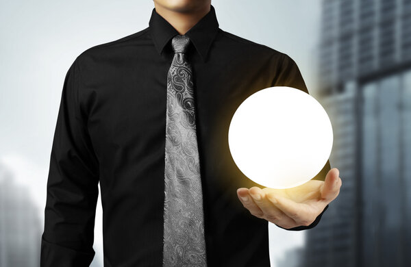 hand holding the Crystal Ball