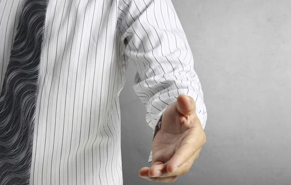 Hombre de negocios con la mano abierta listo — Foto de Stock