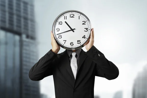 Businessman with alarm clock — Stock Photo, Image