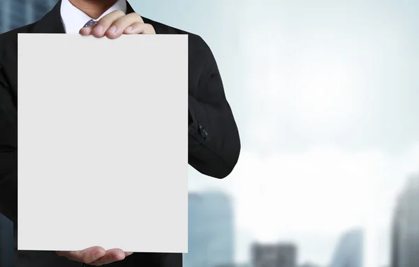 Business man handing a blank business — Stock Photo, Image