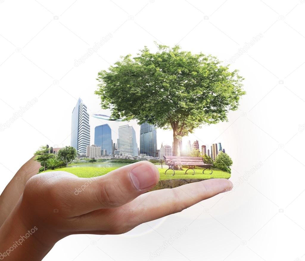 human hand holding city