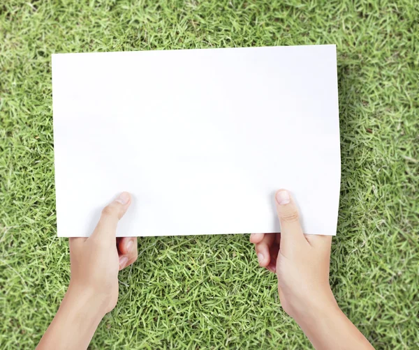 Business man handing blank business card — Stock Photo, Image