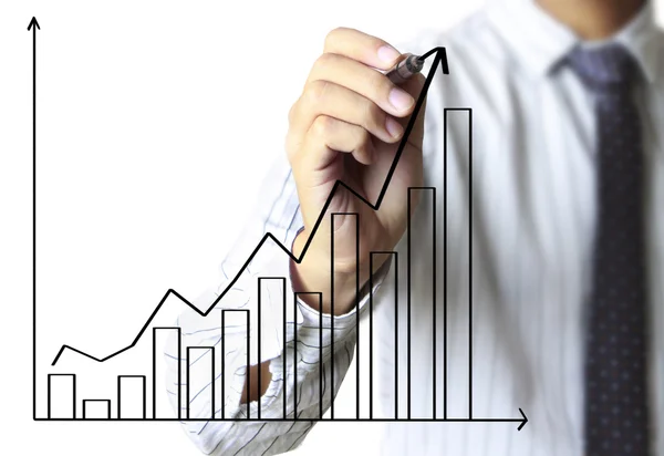 Business man hand drawing graph — Zdjęcie stockowe