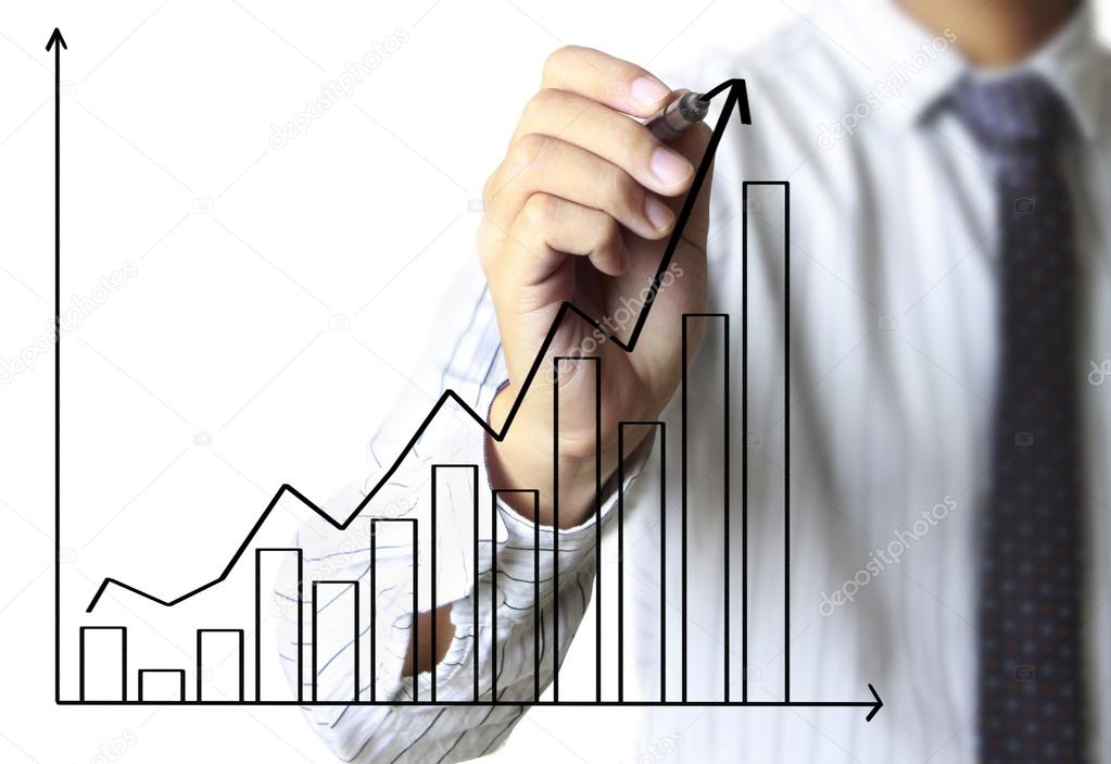 Business man hand drawing graph 
