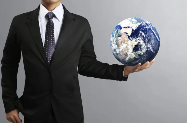 Holding a glowing  earth (NASA) globe — Stock Photo, Image