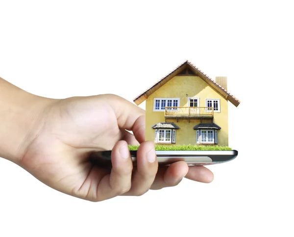 House on a mobile phone, in hand — Stock Photo, Image