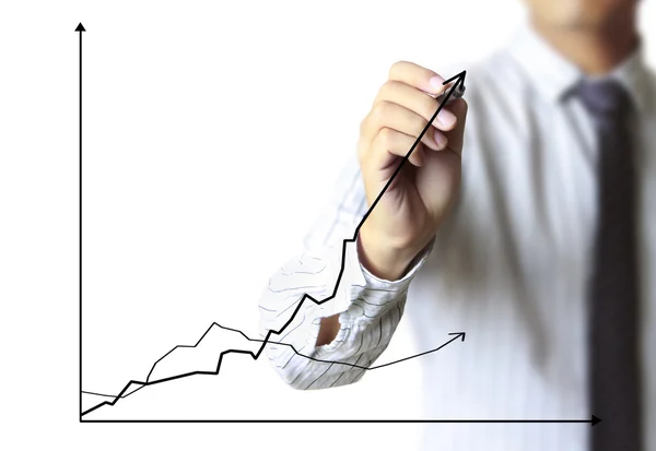 Business man hand drawing graph Stock Picture