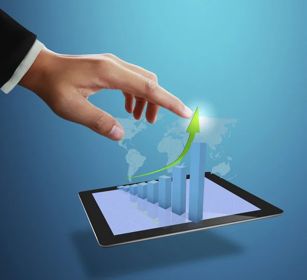 Business man pointing at growth graph — Stock Photo, Image