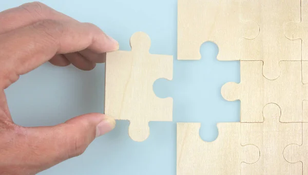 Connecting jigsaw puzzle. Business solutions success and strategy concept