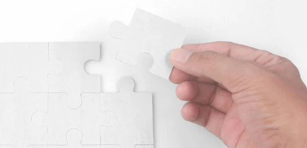 Connecting jigsaw puzzle. Business solutions success and strategy concept