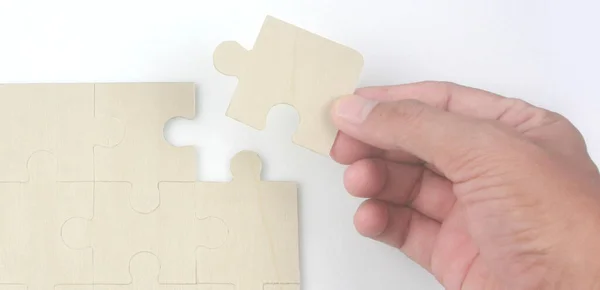 Connecting jigsaw puzzle. Business solutions success and strategy concept